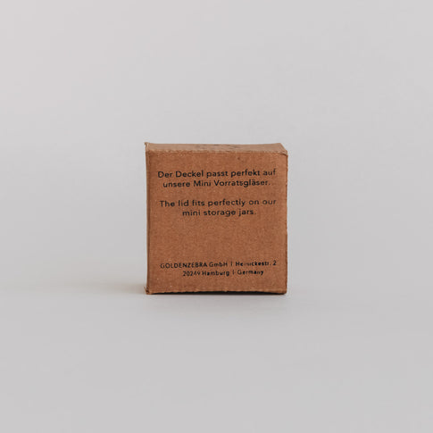 Rückseite der Produktverpackung mit Hinweis: Deckel passend für Mini-Vorratsgläser, Text auf Deutsch und Englisch.