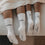 Weiße Kids Socken Ciao Kakao von Eulenschnitt neben weiteren Socken