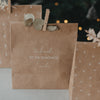 Kraftpapier-Geschenktüte mit Spruch „Vorfreude ist die schönste Freude“ und Eukalyptuszweig